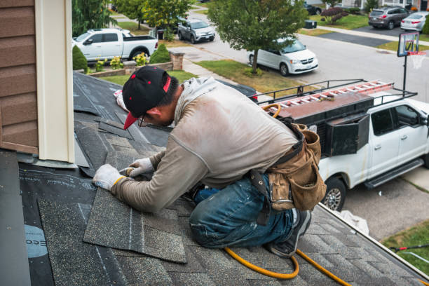 Professional Roofing technician working in Watertown, MA